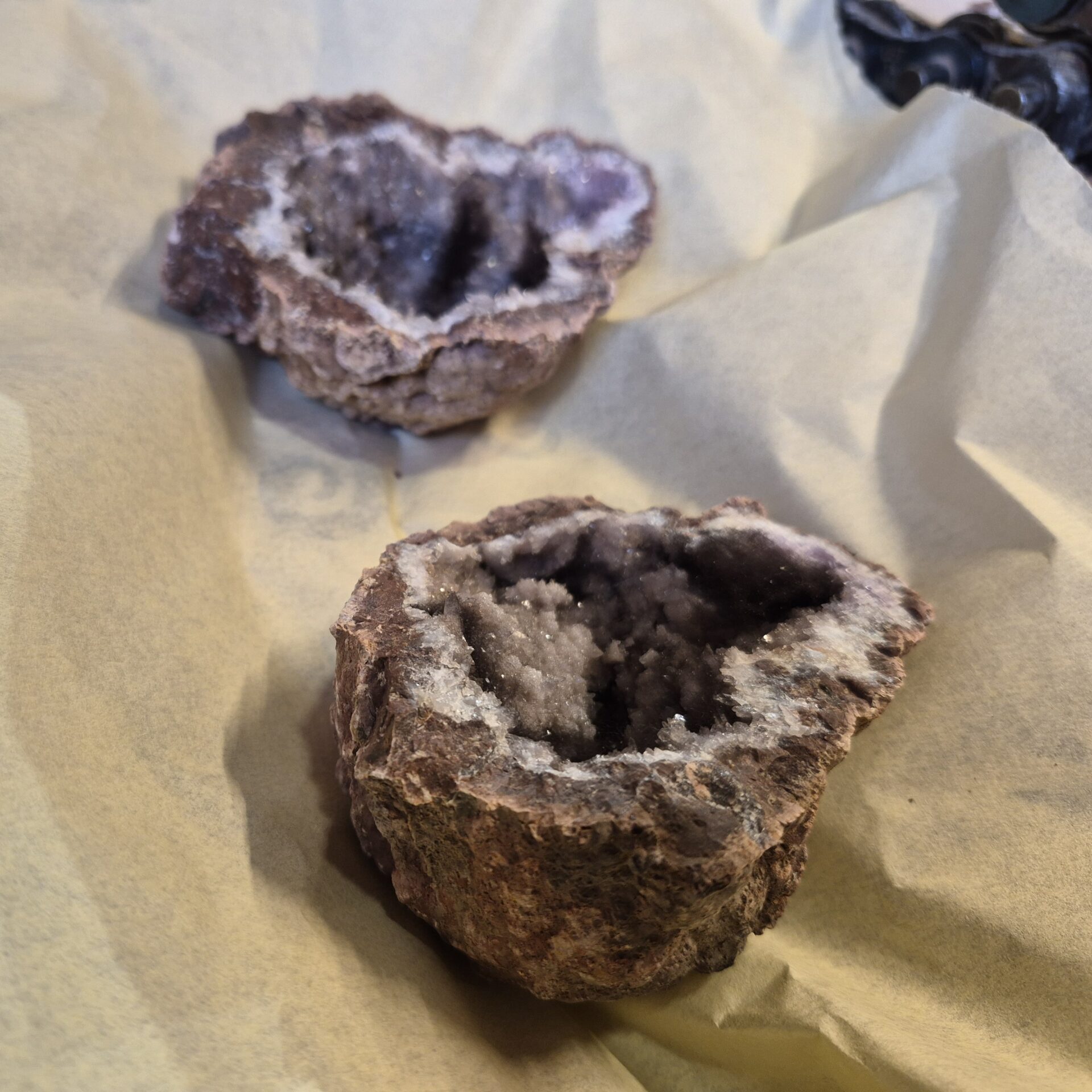 Freshly cracked geode revealing a rare crystal formation at the Kitchener Rock and Gem Expo geode cracking station in Kitchener
